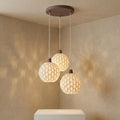Maro Trio Lámpara de Techo — iluminada en un salón