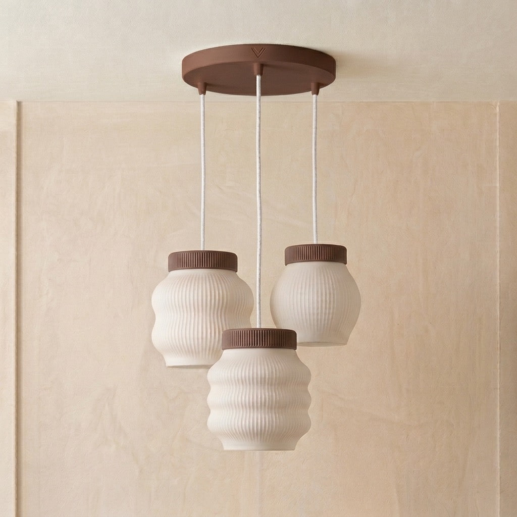 Tengai Trio Lámpara de Techo — iluminada en un salón